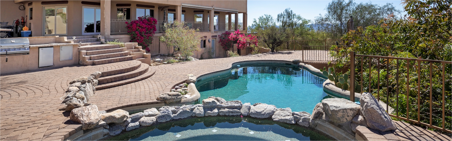 Swimming pool with hot tub