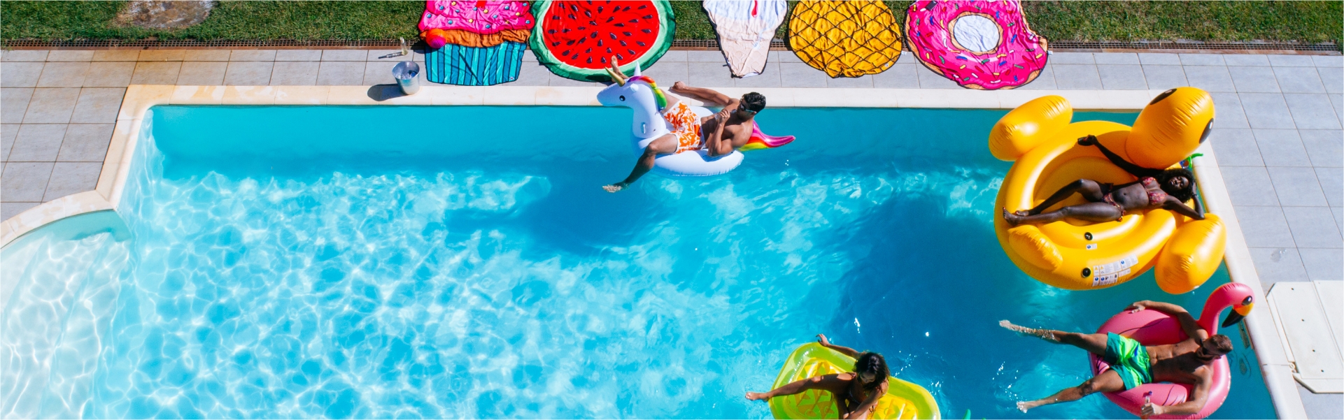 Group of adults on pool floats